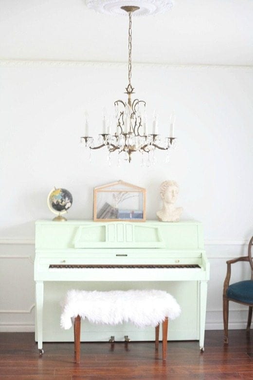 Pale green painted piano - Green is a hot home decor trend right now, so check out these gorgeous furniture flips. Furniture makeovers with all shades of green paint | Green painted furniture. 