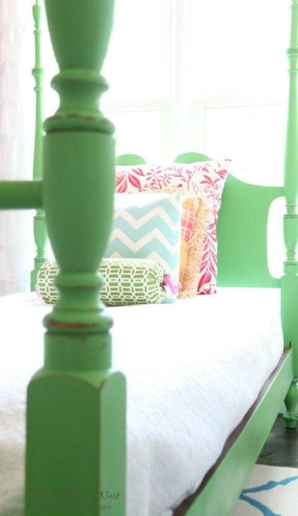 Bright green painted 4-post bed - Green is a hot home decor trend right now, so check out these gorgeous furniture flips. Furniture makeovers with all shades of green paint | Green painted furniture. 