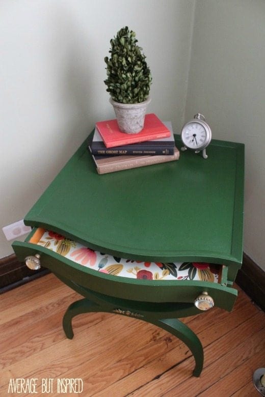 Thrifted green side table - Green is a hot home decor trend right now, so check out these gorgeous furniture flips. Furniture makeovers with all shades of green paint | Green painted furniture. 