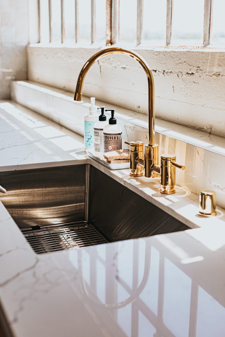 Appliances, kitchen fixtures, bathroom fixtures, and hardware help make a big impact. If you were to think about what a farmhouse kitchen looks like, I am sure you picture the coveted farmhouse sink with brass sink fixtures. This really adds a new level of beauty and is very popular!