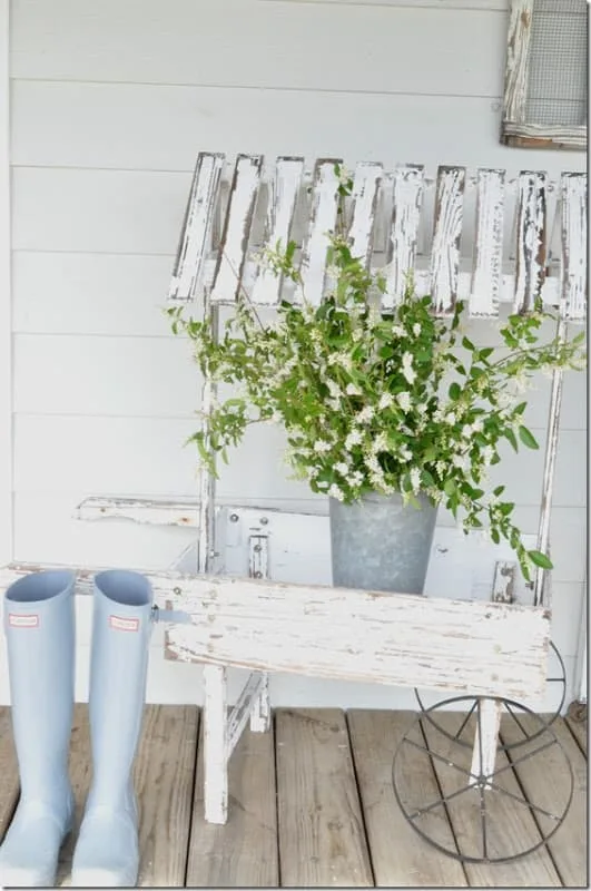 This spring, try incorporating flower pots and pot decor into your DIY front door decorations. Utilize a wreath hanger to hang two or three matching potted plants. Stand out from the crowd with some DIY wreath hanger door decorations. Challenge the traditional norms by changing out wreaths and add flower pots for a pop of color. 