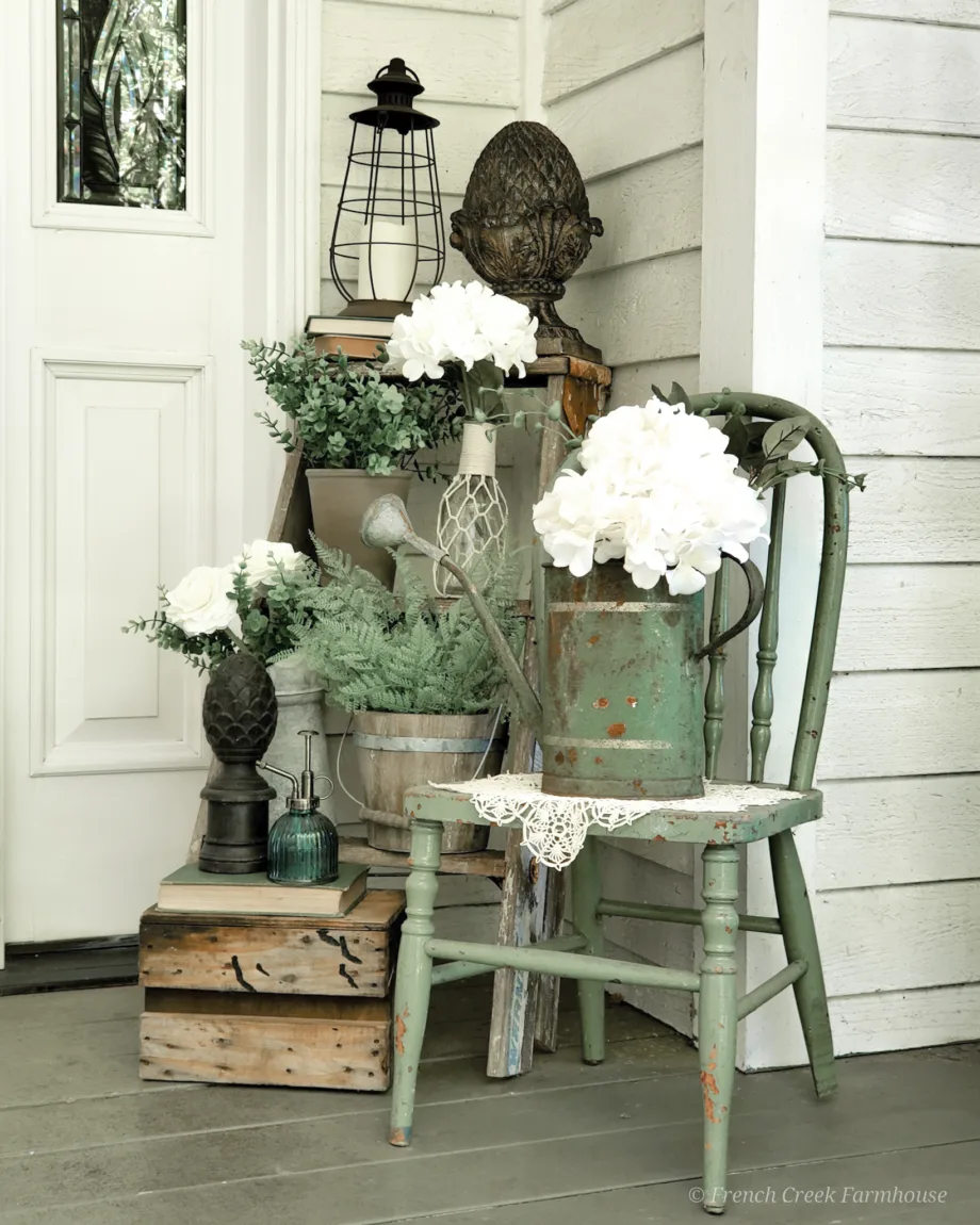 This spring, try incorporating flower pots and pot decor into your DIY front door decorations. Utilize a wreath hanger to hang two or three matching potted plants. Stand out from the crowd with some DIY wreath hanger door decorations. Challenge the traditional norms by changing out wreaths and add flower pots for a pop of color. 