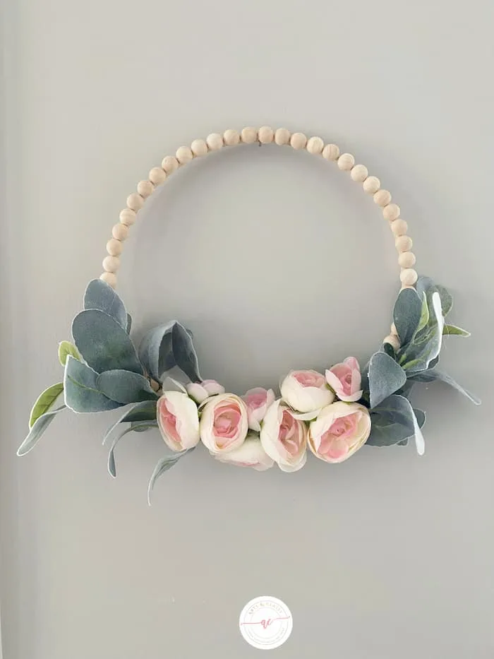 Hang and enjoy this simple DIY spring wreath in your home or on your front door to embrace the season!