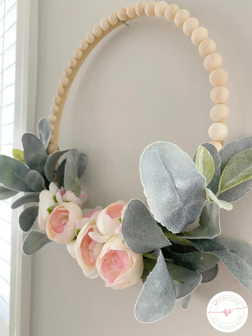 Hang and enjoy this simple DIY spring wreath in your home or on your front door to embrace the season!