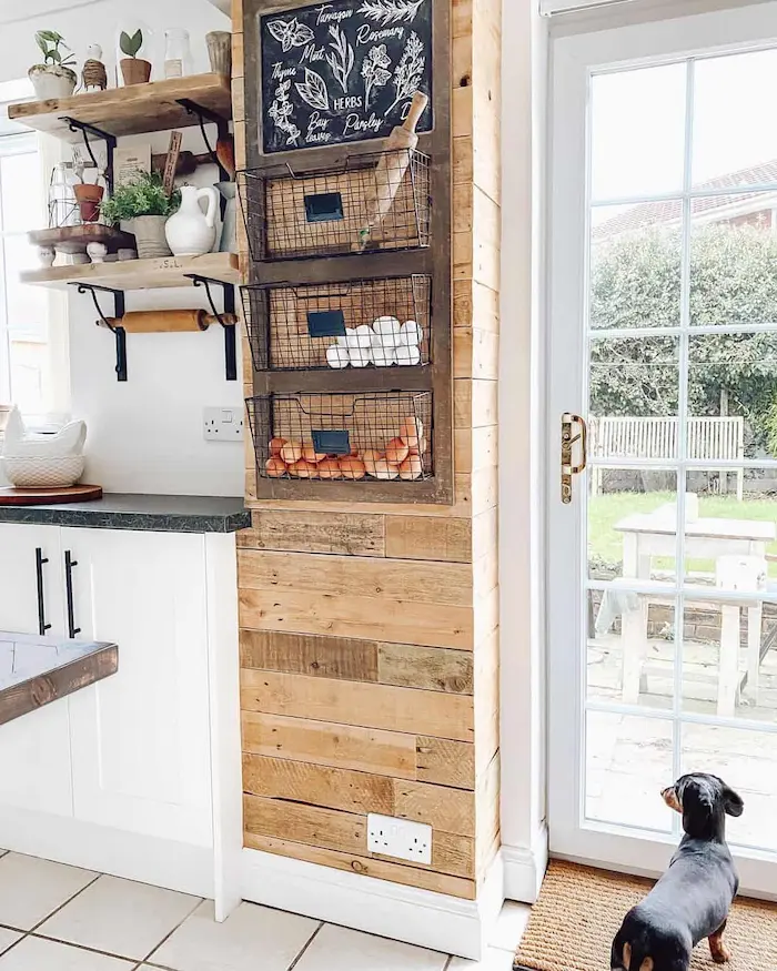Explore a collection of farmhouse kitchen decor ideas that will inspire you to revamp your space with timeless country charm. I love this reclaimed wood accent wall.
