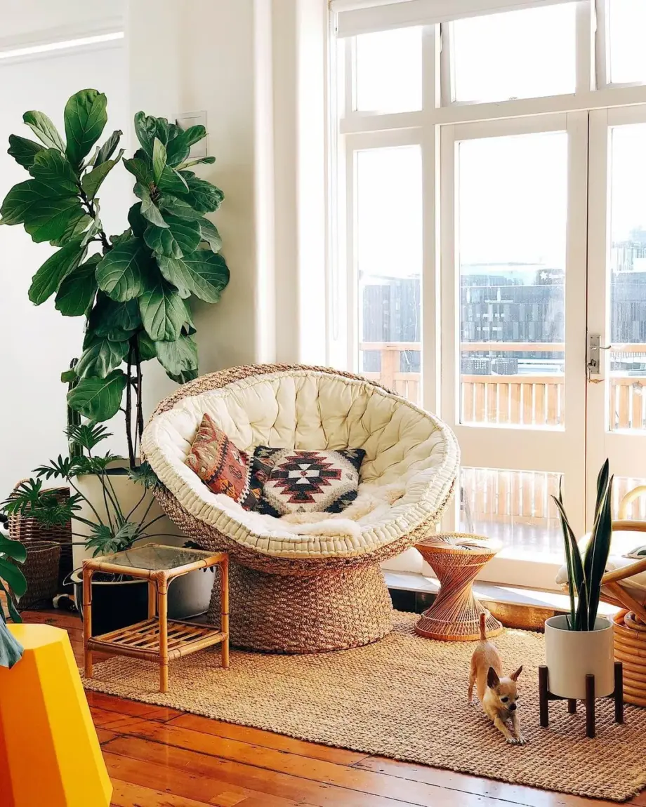 Cozy reading nook with layered blankets and vintage decor