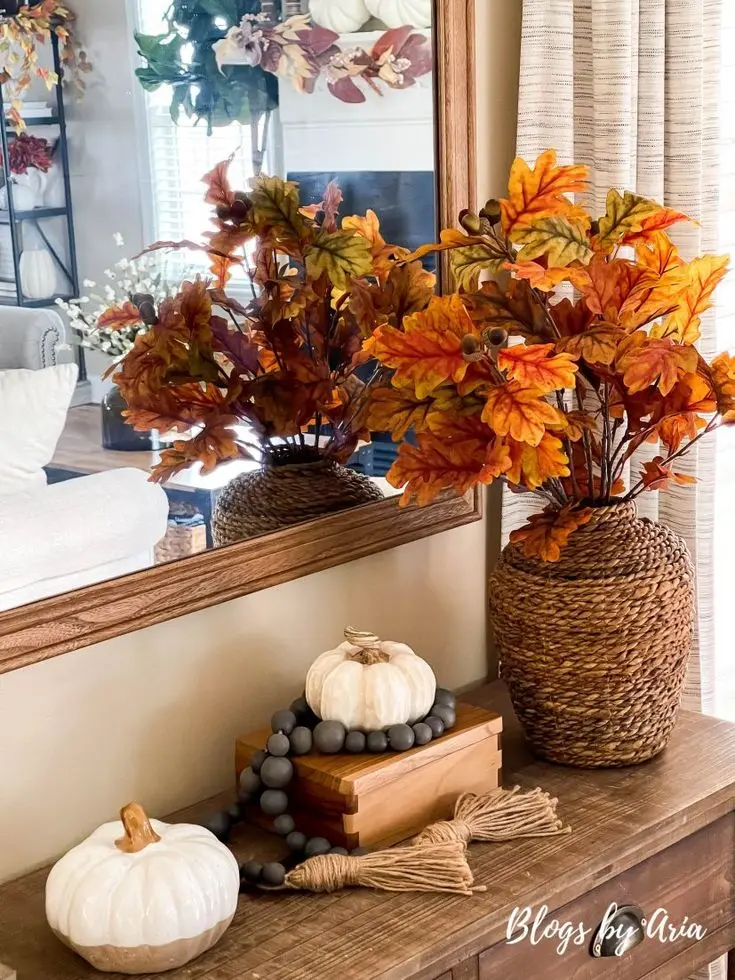 Transform your entryway with these fall decorating ideas. Greet the season with elegance and warmth.
