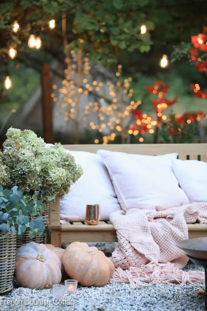 Cozy Outdoor Living with Fall Decor. Create a cozy outdoor living space with fall decor ideas.
