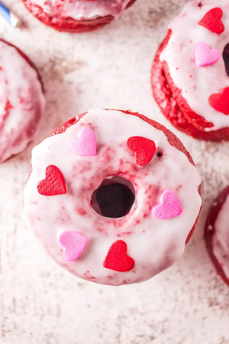 Use a Red Velvet Cake Mix to make these easy Red Velvet Donuts, perfect for Valentine’s Day!